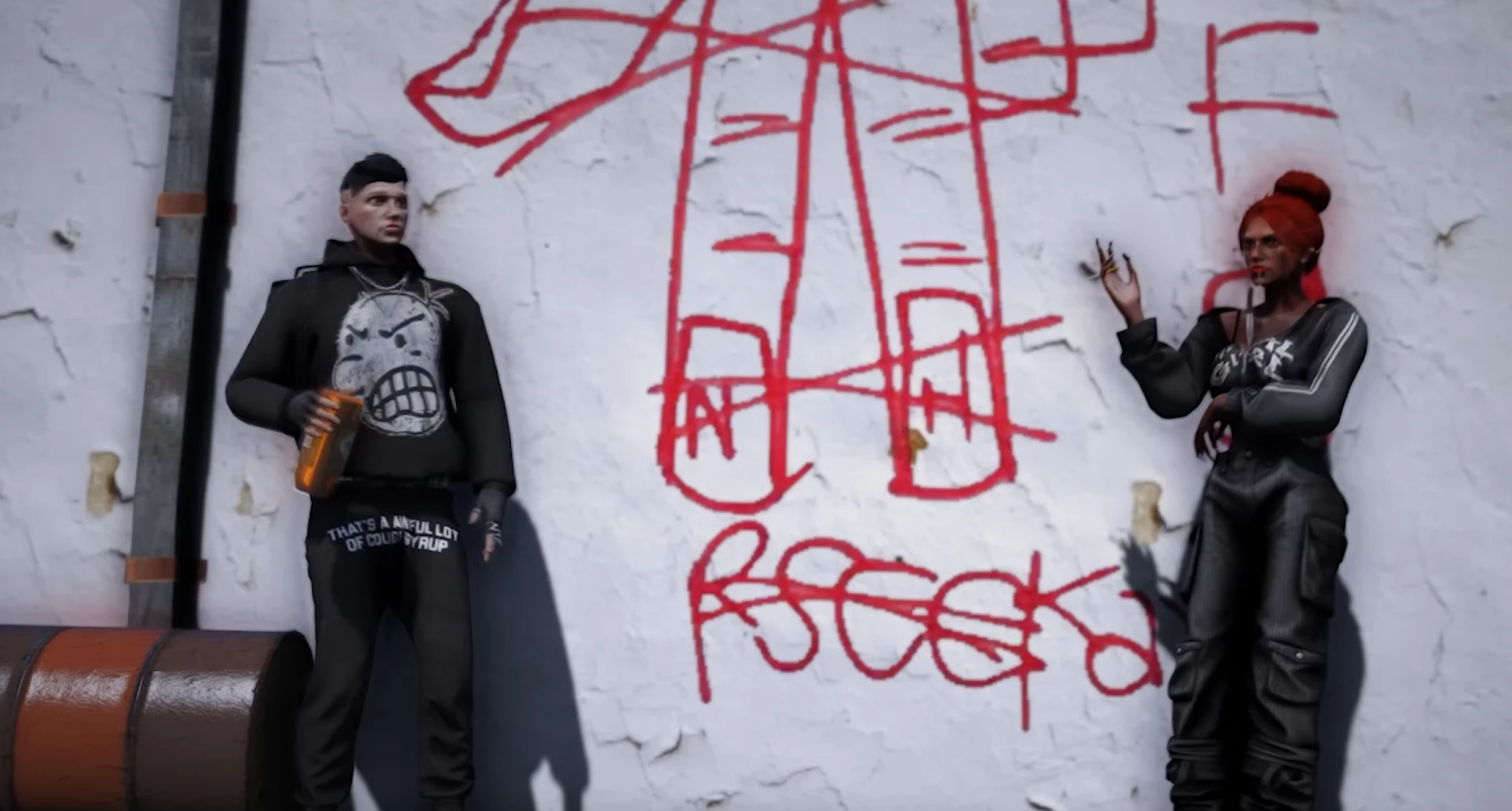 Duo en hoodies devant un mur graffité
